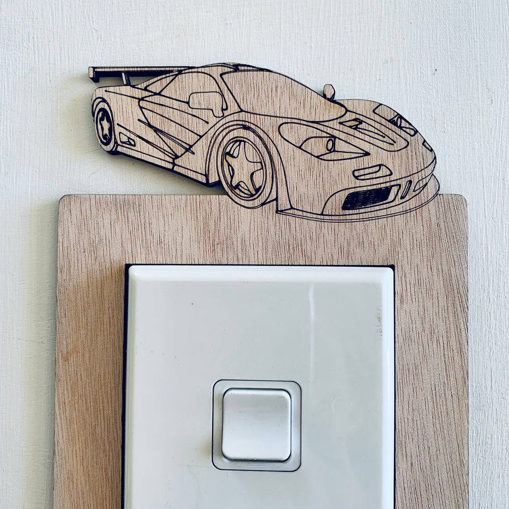 Race car switch surround